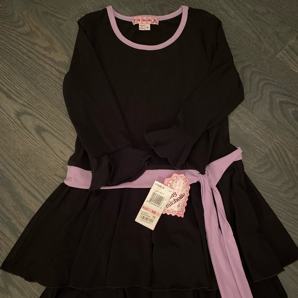 Cute black dress w/lavender belt. NEW with tags!!